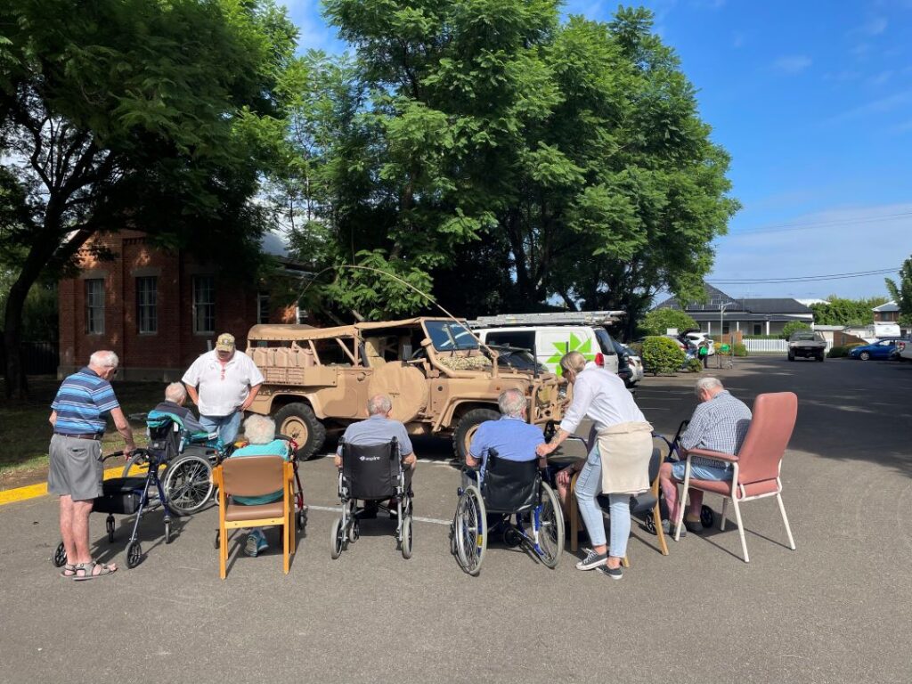 old people in a wheelchair outdoor